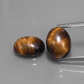 3.09 ct Brown Tiger's Eye Gemstone, Tiger's Eye Gem in Oval Cabochon Shape for Sale.