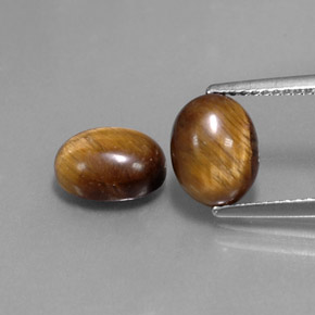 4.04 ct Brown Tiger's Eye Gemstone, Tiger's Eye Gem in Oval Cabochon Shape for Sale.