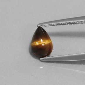 0.70 ct Brown Tiger's Eye Gemstone, Tiger's Eye Gem in Pear Cabochon Shape for Sale.