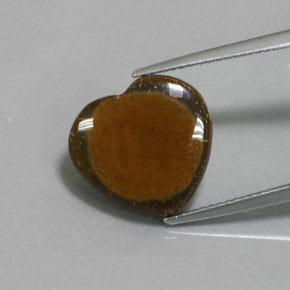 7.51 ct Brown Tiger's Eye Gemstone, Tiger's Eye Gem in Heart Cabochon with Hole Shape for Sale.