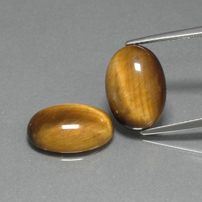 Brun doré Oeil de Tigre gemme - 4.6ct Ovale Cabochon (ID: 396675)