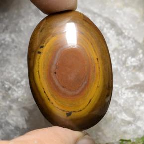 89.4ct Oval Cabochon Gold Brown Tiger's Eye for sale thumb image of 89.4ct Oval Cabochon Gold Brown Tiger's Eye (ID: 471284)