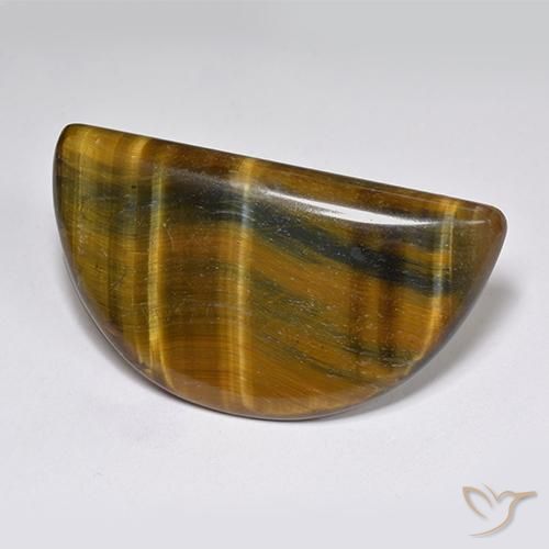 25,48 ct Fancy Tiger's Eye, 33,4 x 18,7 mm De Tailandia, Photo A