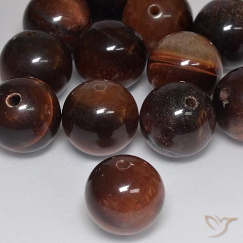 147.10 ctw Brown Tiger's Eye Stones, Natural Tiger's Eye in Drilled Sphere Shape for Sale