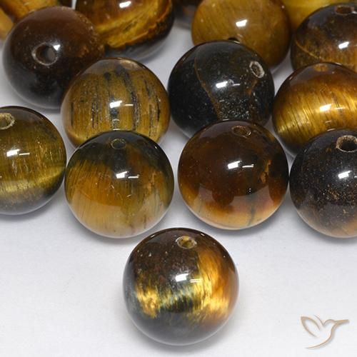Oeil de tigre sphérique percé de 12,53 ct, 12,1 mm de l'Inde, Photo A