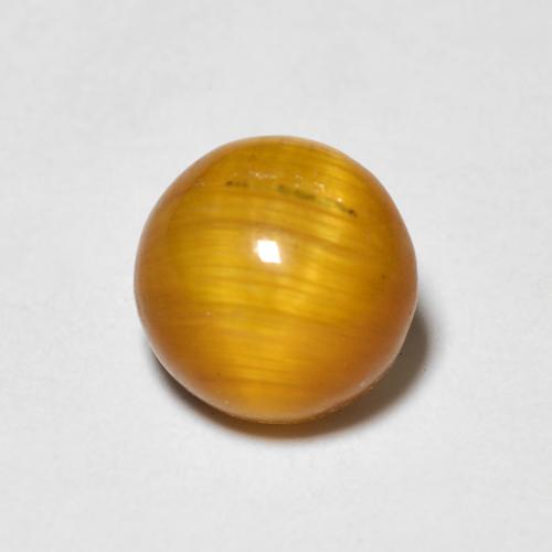 来自泰国的 0,95 克拉圆形 金色虎眼石,尺寸 6,2 mm 毫米,不透明净度,天然宝石,1 金棕色虎眼石,莫氏硬度为 6,5 - 7 适合日常佩戴饰品, Photo A