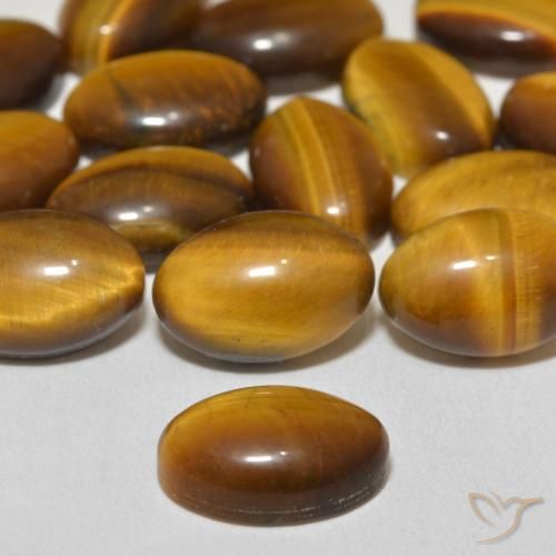 Tiger's Eye Gemstones in 12 x 8 mm (calibrated) Size for Sale, Tiger's Eye Stones in Warm Brown Color