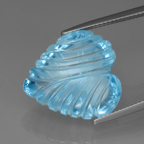 27.79 ct Blue Topaz Gemstone, Topaz Gem in Carved Heart Shape for Sale.