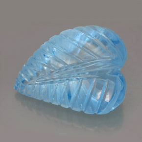 27.74 ct Blue Topaz Gemstone, Topaz Gem in Carved Leaf Shape for Sale.