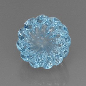 8.90 ct Blue Topaz Gemstone, Topaz Gem in Carved Flower Shape for Sale.