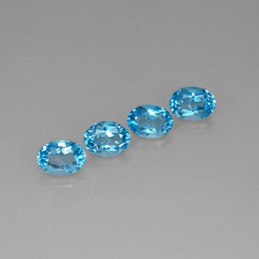 6.55 ct Blue Topaz Stone, Natural Topaz in Oval Facet Shape for Sale