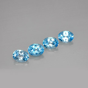 6.39 ct Blue Topaz Stone, Natural Topaz in Oval Facet Shape for Sale
