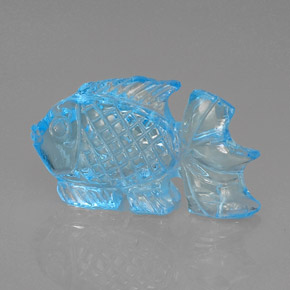 18.94 ct Blue Topaz Gemstone, Topaz Gem in Carved Fish Shape for Sale.