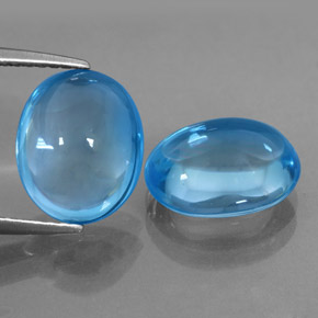 7.74 ct Blue Topaz Gemstone, Topaz Gem in Oval Cabochon Shape for Sale.
