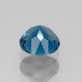 Topaz Gemstone in 7 mm (calibrated) Size for Sale, Topaz Stone in London Blue Color