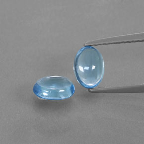 0.9ct Oval Cabochon Swiss Blue Topaz for sale thumb image of 0.9ct Oval Cabochon Swiss Blue Topaz (ID: 376808)