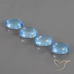 Lot de 4pcs Topazes Bleu oval cabochon du Brésil - Taille 7 x 5,1mm, poids total 3,94 ct / moyenne 0,99 ct chaque, couleur : Bleu Suisse, dureté de Mohs 8 convient aux bijoux de tous les jours, pierre de sagesse, Année de la pierre précieuse du cheval, Photo A