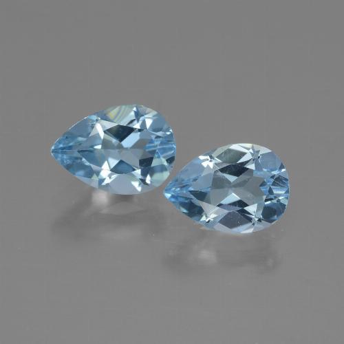Coppia topazio Pera abbinata 7,3 x 5,3mm - Peso 1,82 ct totali / media. 0,91 ct ciascuno, pietra preziosa naturale , colore Blu svizzero in purezza VVS-VS, durezza Mohs 8 adatto per gioielli da indossare ogni giorno, Simboleggia la buona salute, Photo A