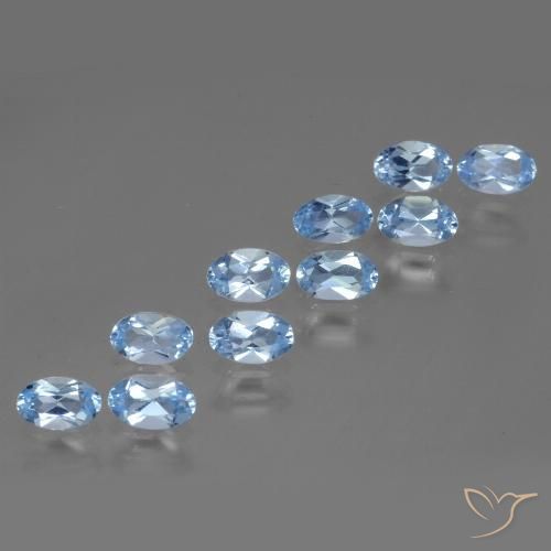 Lote de 10 piezas de Topacio Azul Forma ovalada de Brasil - Peso 3,2 ct en total / promedio. 0,32 ct cada uno, Tamaño 5,2 x 3,3mm, Color: Azul Cielo, Dureza Mohs 8 Adecuado para joyas de uso diario, Piedra del zodiaco Sagitario, Photo A