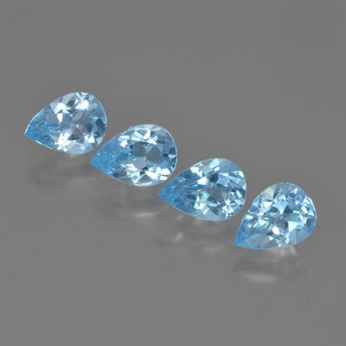 Lot of 4pc Pear Blue Topaz from Brazil - Size 6.8 x 4.9mm, Weight 2.93ct total / avg. 0.73ct each, Color: Baby Blue, Mohs Hardness 8 suitable for daily wear jewelry, Symbolizes Good Health, Photo A