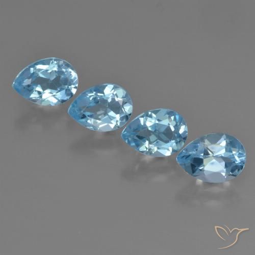 Lot de 4pc Topazes Bleu pear facet du Brésil - Poids total 3,7 ct / moyenne 0,93 ct chaque, taille 7,2 x 5,2mm, couleur : Bleu maya profond, dureté de Mohs 8 convient aux bijoux de tous les jours, pierre de sagesse, Pierre de naissance de novembre, Photo A