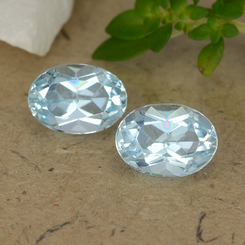 6,9 x 4,9mm Oval Topas-Paar - Gewicht 1,94 ct gesamt / durchschnittl. 0,97 ct, Garantiert natürliche Edelsteine, Hellblau Farbe in VVS-VS Reinheit, Mohs-Härte 8 Geeignet für den täglichen Gebrauch im Schmuck, Sternzeichen Schütze, Photo A