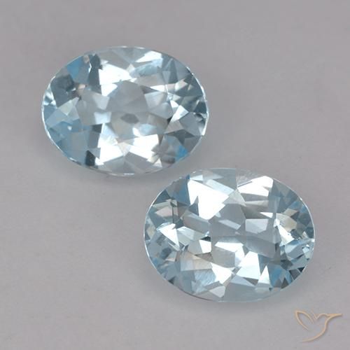 Par de Topacio Ovalada a juego de 9,1 x 7,1mm - Peso 4,12 ct en total / promedio. 2,06 ct cada uno, color Azul Cielo en claridad vvs, piedra preciosa natural , dureza de Mohs 8 Adecuado para joyas de uso diario, Piedra natal de noviembre, Photo A