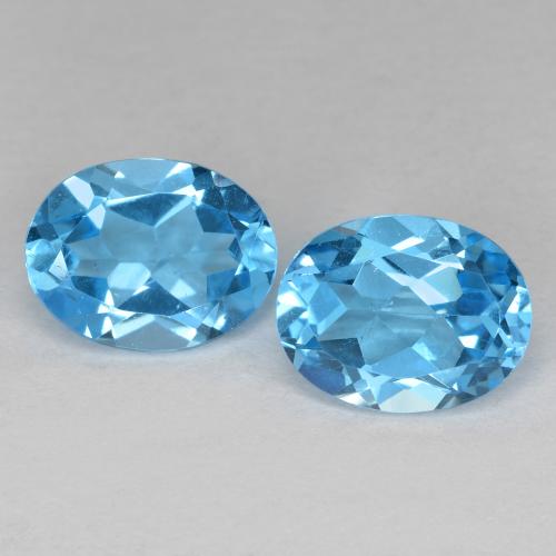 Coppia topazio taglio ovale da 9,1 x 7,1mm abbinati - Peso 4,39 ct totali / media. 2,2 ct ciascuno, colore Azzurro in purezza VS, pietra preziosa naturale , durezza Mohs 8 adatto per gioielli da indossare ogni giorno, Pietra portafortuna di novembre, Photo A