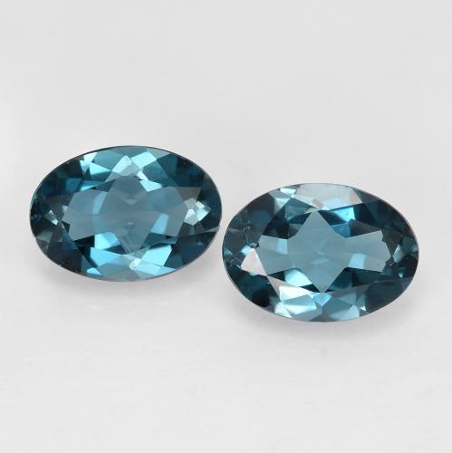 7 x 5mm Matching Oval Topaz Pair - Weight 1.62ct total / avg. 0.81ct each, Deep Navy Blue Color in VVS-VS Clarity, Natural Gemstone, Mohs Hardness 8 suitable for daily wear jewelry, November Birthstone, Photo A