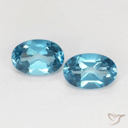 1.24 ct Loose London Blue Topaz, 6.1 x 4.1 mm Oval Cut From Brazil, Photo A