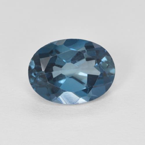 Topacio Azul Forma ovalada de 7,9 x 5,9mm de Brasil, peso de 1.38 ct, piedra preciosa natural Irradiado en claridad vvs, Topacio de 1 pieza - Color: Azul Londres, dureza Mohs de 8 Adecuado para joyas de uso diario, Piedra dorada, Photo A