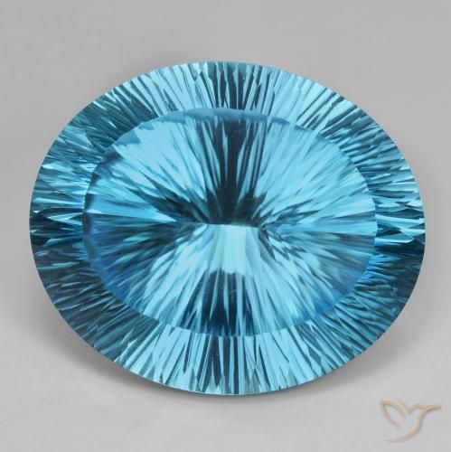 75.76 ct Loose Blue Topaz, 28.7 x 24.1 mm Oval Concave Cut From Brazil, Photo A