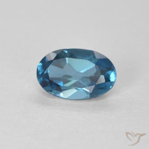 0.61 ct Blue Topaz Stone, Natural Topaz in Oval Facet Shape for Sale