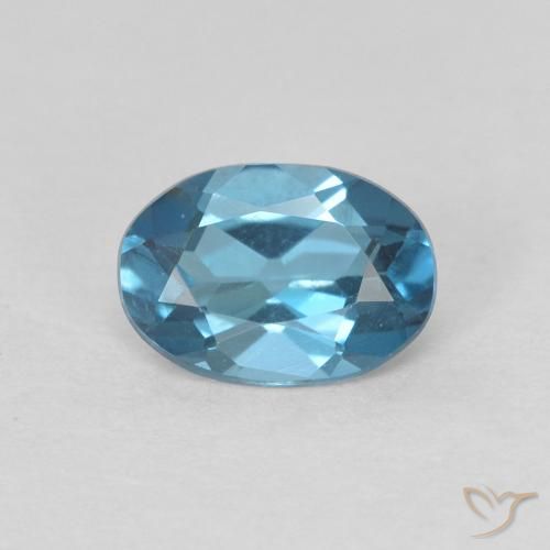 0.82 ct London Blue Topaz, 6.8 x 4.8 mm Oval Cut From Brazil, Photo A