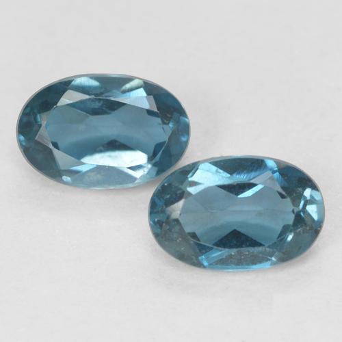6,1 x 4mm Oval Topas-Paar - Gewicht 1,18 ct gesamt / durchschnittl. 0,59 ct, Garantiert natürliche Edelsteine, London Blau Farbe in VVS Reinheit, Mohs-Härte 8 Geeignet für den täglichen Gebrauch im Schmuck, Sternzeichen Schütze, Photo A