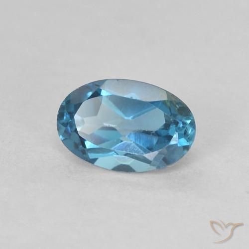 0.61 ct Blue Topaz Stone, Natural Topaz in Oval Facet Shape for Sale