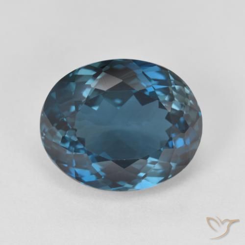 Topacio Azul Londres Ovalada de 6.93 ct de Brasil, dimensión 12 x 9,8mm, piedra preciosa natural Irradiado, claridad vvs-vs, Topacio Forma ovalada de 1 pieza, dureza de Mohs de 8 Adecuado para joyas de uso diario , Simboliza la buena salud, Photo A