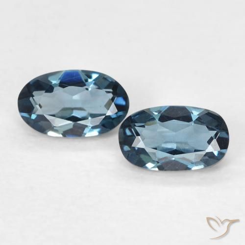 0.6 ct Loose London Blue Topaz, 5.1 x 3.1 mm Oval Cut From Brazil, Photo A