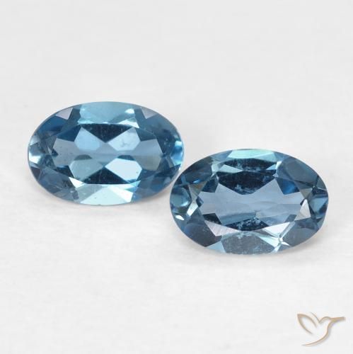 0.99 ct Loose London Blue Topaz, 6.1 x 4 mm Oval Cut From Brazil, Photo A