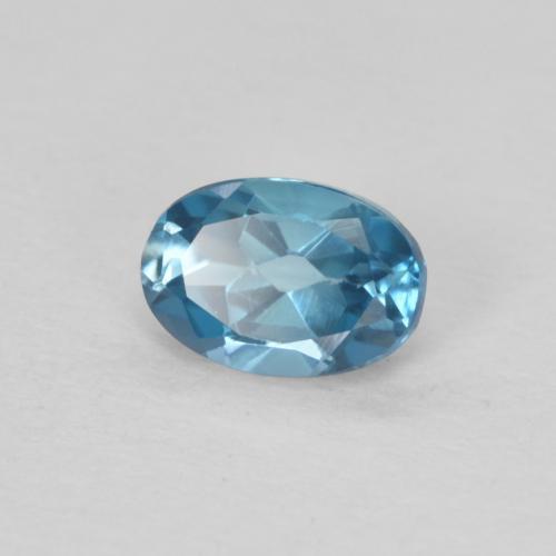 0.59 ct Blue Topaz Stone, Natural Topaz in Oval Facet Shape for Sale