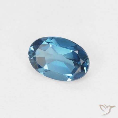 0.59 ct Blue Topaz Stone, Natural Topaz in Oval Facet Shape for Sale