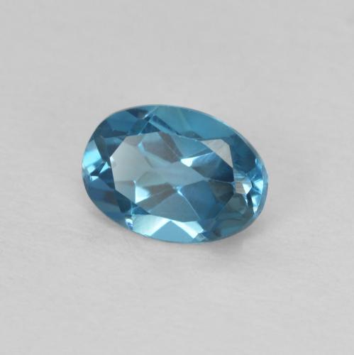0.58 ct Blue Topaz Stone, Natural Topaz in Oval Facet Shape for Sale