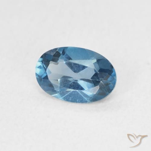 0.57 ct Blue Topaz Stone, Natural Topaz in Oval Facet Shape for Sale
