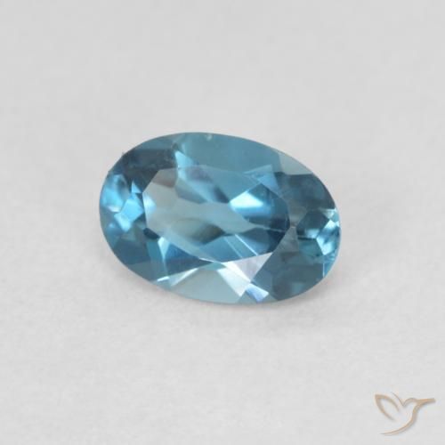 0.61 ct Blue Topaz Stone, Natural Topaz in Oval Facet Shape for Sale