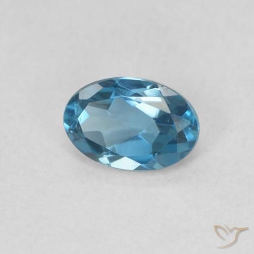 0.59 ct Blue Topaz Stone, Natural Topaz in Oval Facet Shape for Sale