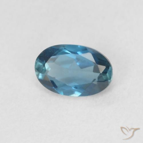 0.59 ct Blue Topaz Stone, Natural Topaz in Oval Facet Shape for Sale