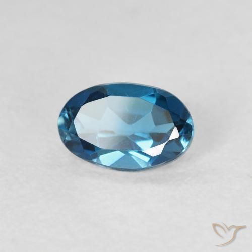 0.57 ct Blue Topaz Stone, Natural Topaz in Oval Facet Shape for Sale