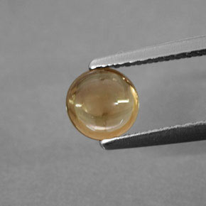 0.74 ct Yellow Tourmaline Gemstone, Tourmaline Gem in Round Cabochon Shape for Sale.