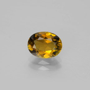 Golden Orane to Deep Brown Турмалин Камень - 1.6ct Фасетный Овал (ID: 381689)