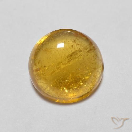 7.1mm Round Golden Tourmaline from Mozambique, Weight of 1.54ct, Natural untreated Gemstone in Transparent Clarity, 1pc Round Cabochon Tourmaline - Color: Deep Golden Orange, Mohs Hardness of 7 - 7.5 suitable for daily wear jewelry, Symbolizes Protection, Photo A